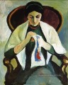 Femme brodant dans un fauteuil Portrait des artistes Femme August Macke